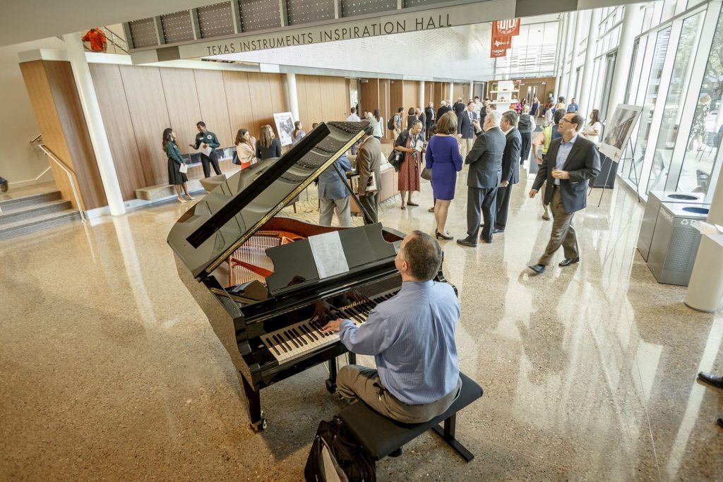 Man playing the piano at the Davidson-Gundy Alumni Center
