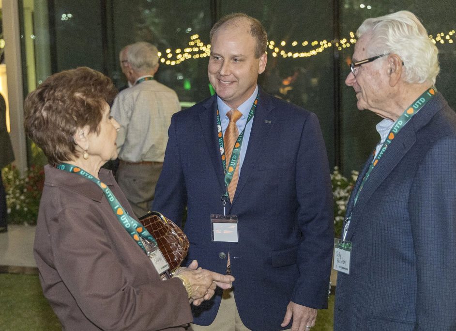 Kyle Edgington PhD’13, vice president for Development and Alumni Relations (center), talks to Selly and Joyce Belofsky at the Celebration of Support.