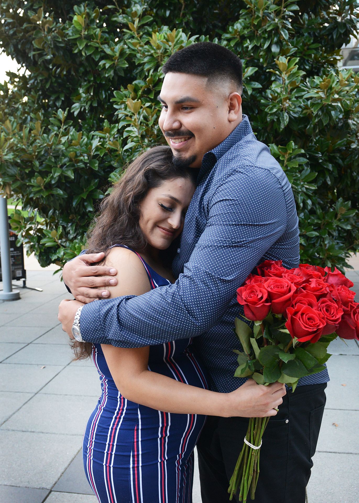 Chris Hernandez hugging girlfriend Blanca Roque-Mancera on the Chess Plaza.