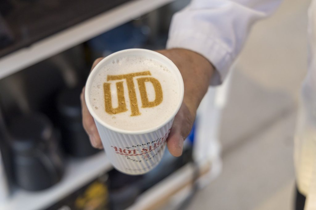 Latte with UTD logo printed on the foam.