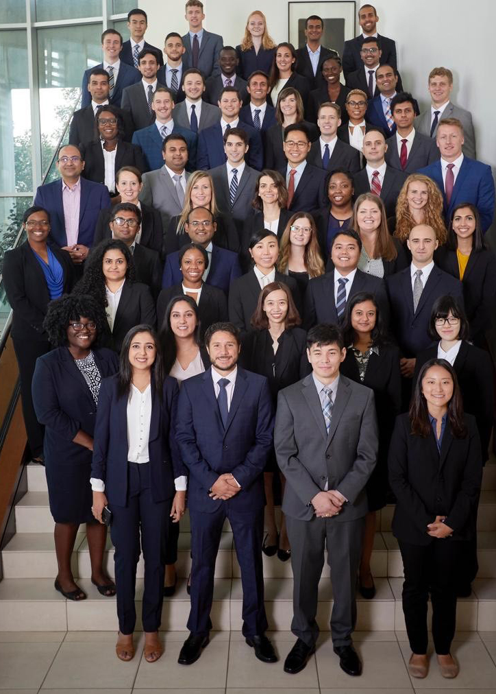 Jessica Thompson (fifth row) posing for a group photo with her UT Dallas MBA class.