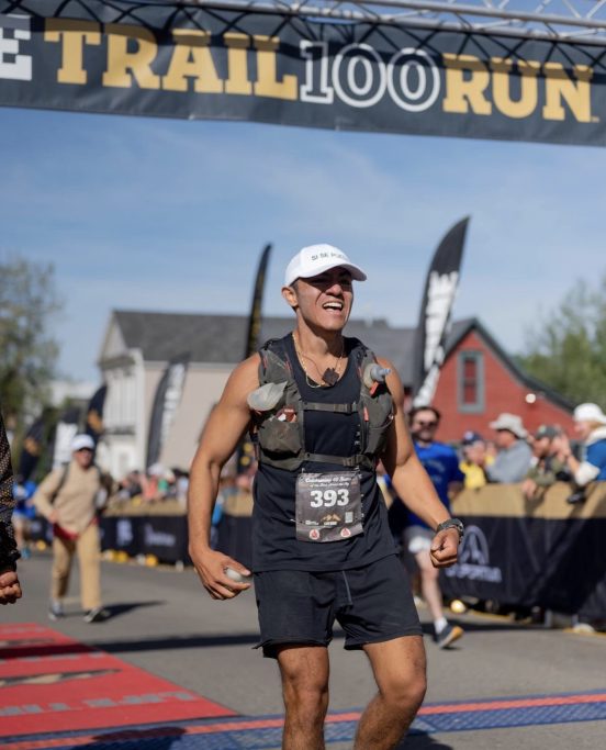 Daniel Flores crossing the finish line at the Leadville Trail 100.